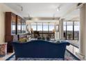 Spacious living room filled with natural light, complemented by refined furnishings and a balcony view at 145 15Th Ne St # 843, Atlanta, GA 30309
