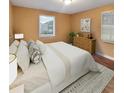 Comfortable bedroom featuring neutral tones, a large window, and modern furnishings at 2061 Detroit Nw Ave, Atlanta, GA 30314