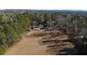 Expansive acreage showcasing a beautiful home, mature trees, and ample space at 1325 Whitlock Sw Ave, Marietta, GA 30064