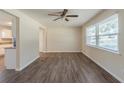 Inviting dining area with modern flooring and a view into the kitchen, perfect for Gathering meals at 2167 Kilarney Rd, Decatur, GA 30032