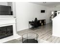 Bright and airy living room featuring a fireplace and sleek furniture at 2744 Snapfinger Mnr, Decatur, GA 30035