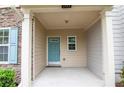 Inviting covered front porch offering ample space and a welcoming entrance at 2453 Suwanee Pointe Dr, Lawrenceville, GA 30043