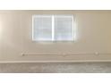 Bright basement features a large window, creating a naturally lit space at 2973 Cambridge Sw Dr, Atlanta, GA 30331