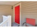 Inviting front door with a bright red color, enhancing the home's curb appeal at 2937 Torreya Way, Marietta, GA 30067
