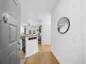 Welcoming entryway with hardwood floors, neutral walls, and a stylish mirror at 821 Ralph Mcgill Ne Blvd # 3201, Atlanta, GA 30306