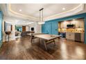 Finished basement area with a wet bar, game area, and living space at 2660 Burnt Hickory Dr, Cumming, GA 30028