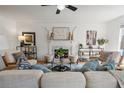 Cozy living room with fireplace, comfortable seating, and stylish decor at 6 Walnut Hill Nw Pl, Atlanta, GA 30318