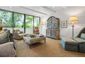 Comfortable living room featuring stylish furniture, large windows, and a serene atmosphere at 2575 Peachtree Ne Rd # 8D, Atlanta, GA 30305