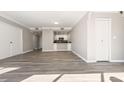 Spacious living room boasts stylish wood floors, neutral walls, and an open layout, perfect for entertaining and relaxation at 3481 Lakeside Ne Dr # 2303, Atlanta, GA 30326