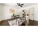 Bright office space featuring an area rug, fan, and desk at 320 Woodlake Ct, Alpharetta, GA 30005