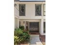 Inviting townhome entrance featuring a double door and manicured landscaping at 3772 Paces Ferry West Se, Atlanta, GA 30339