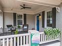 Inviting front porch with seating, a ceiling fan, and decorative flower boxes at 942 Byron Sw Dr, Atlanta, GA 30310