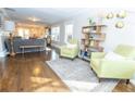 Spacious living room with hardwood floors, comfortable seating, and contemporary decor at 988 Farrington Se Pl, Atlanta, GA 30315