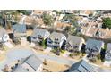 Aerial view of a residential neighborhood showcasing well-maintained homes, streets, and green spaces at 4916 Kentwood Dr, Marietta, GA 30068
