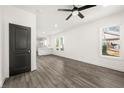Bright, open-concept living area with modern floors, fresh paint, and ample natural light at 1106B Wedgewood Nw Dr, Atlanta, GA 30318