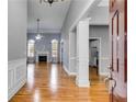 Elegant living room with hardwood floors, fireplace, and high ceilings at 2175 Ashton Dr, Villa Rica, GA 30180