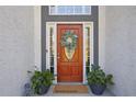 Close-up of the beautiful front door with wreath and sidelights at 2647 Old Hickory Nw Dr, Marietta, GA 30064