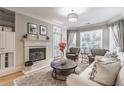 Cozy living room features a fireplace with large windows that provide lots of natural light at 825 Highland Ln # 1105, Atlanta, GA 30306