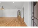 Bright living room with hardwood floors, detailed trim, and an open floor plan that is perfect for entertaining at 239 E Wesley Ne Rd, Atlanta, GA 30305