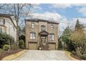 Charming brick two-story home with a two-car garage and inviting curb appeal at 3081 Dickson St, Brookhaven, GA 30319