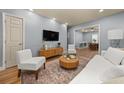 Inviting living room with modern furniture, hardwood floors, and neutral color palette at 1707 Terry Mill Road Se Rd, Atlanta, GA 30316