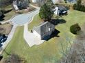 Spacious property in a serene neighborhood, showcasing lush greenery and ample space for outdoor activities at 30 Barbara Ct, Fayetteville, GA 30215