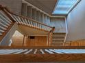 View of the carpeted staircase and hardwood floors from above the second floor at 1272 Creekside Se Ter, Smyrna, GA 30082