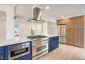 Modern kitchen with stainless steel appliances, an island cooktop, and ample cabinet space at 291 Lamplighter Se Ln, Marietta, GA 30067