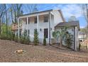 Beautiful two-story home with a covered porch and a well-maintained front yard at 5664 Colton Dr, Atlanta, GA 30342