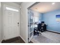 Bright office space with French doors, modern desk, and large window that floods the room with natural light at 6101 Providence Way, Union City, GA 30291