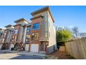 Contemporary townhome with brick facade and modern architectural details at 975 Moda Dr, Atlanta, GA 30316