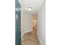 Inviting entryway with tile flooring leads into the home at 1280 W Peachtree Nw St # 3709, Atlanta, GA 30309
