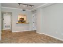 Open concept living space featuring pass-through to the kitchen at 1280 W Peachtree Nw St # 3709, Atlanta, GA 30309
