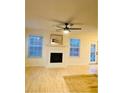 Bright living room features a fireplace and plenty of natural light at 3466 Carriage Chase Rd, Atlanta, GA 30349