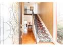 Entryway with hardwood floors, decorative staircase, and views of the home's interior at 1511 Womack Rd, Atlanta, GA 30338