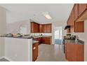 Well-maintained kitchen featuring wooden cabinetry and functional layout at 1715 Branchwood Ct, Powder Springs, GA 30127