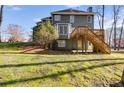 This home has a spacious backyard with a deck, perfect for outdoor entertaining at 5712 Overlook Cir, Powder Springs, GA 30127