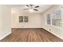 Spacious living room featuring modern flooring, neutral colors, and natural light at 3169 Bluebird Ln, Decatur, GA 30032