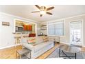 Bright living room showcases hardwood floors and open kitchen view at 300 W Peachtree St # 4A, Atlanta, GA 30308