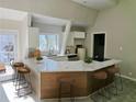 Modern kitchen with stainless steel appliances, subway tile backsplash, and eat-in breakfast bar at 1920 Moores Mill Nw Rd, Atlanta, GA 30318