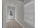 Bright entryway with durable floors, a white door with window panes, and ample natural light at 2776 Aralynn Way, College Park, GA 30337