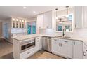 Bright kitchen featuring white cabinets, stainless steel appliances, and granite countertops at 2690 Valvedere Dr, Brookhaven, GA 30319