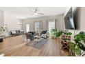 Inviting living room with a plush sofa, decorative rug, and ample natural light at 6372 Rosetta Sw Dr, Atlanta, GA 30331