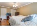 Spacious bedroom with warm colors, ample closet space, and hardwood floors at 885 Briarcliff Ne Rd # D3, Atlanta, GA 30306