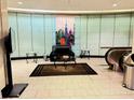 Welcoming lobby area with seating, modern art, and convenient access to an escalator at 20 Nw Marietta St, Atlanta, GA 30303