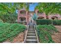 Attractive multi-story brick apartment building with manicured landscaping and wrought iron railings at 795 Ponce De Leon Ne Pl # C3, Atlanta, GA 30306