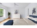 Serene main bedroom featuring hardwood floors, soft natural light, and tasteful decor at 795 Ponce De Leon Ne Pl # C3, Atlanta, GA 30306