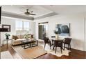 Open concept living room with a cozy seating area and dining space, perfect for entertaining at 2881 Peachtree Ne Rd # 702, Atlanta, GA 30305