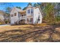 Charming two-story home with a side entrance and a wooded lot at 82 Austin Bridge Ln, Douglasville, GA 30134