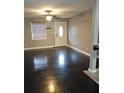 Inviting living room featuring hardwood floors, neutral-colored walls, a ceiling fan, and a window with blinds at 2383 Baywood Se Dr, Atlanta, GA 30315